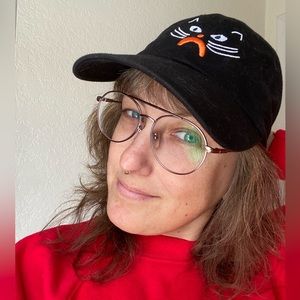 Kristina Micotti Sad Cat Face Embroidered Adjustable Dad Hat